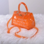 Picture of Small Orange Transparent Hand Bag For Women