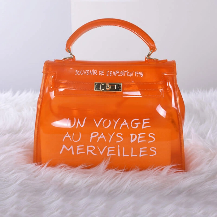 صورة حقيبة يد كبيرة شفافة برتقالي نسائي
