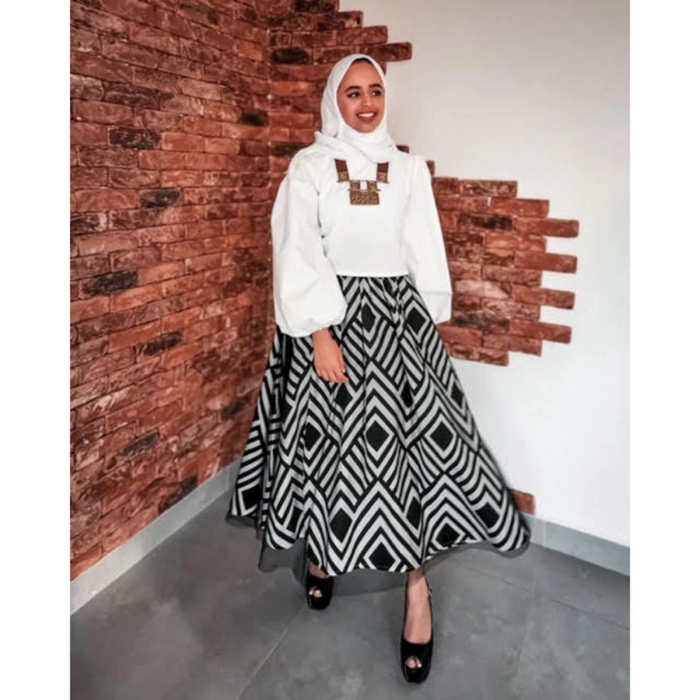 Picture of White Puffy Top With Black Pattern Skirt From Lulwa Al Khattaf