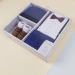 صورة صندوق هدايا للمواليد من ٤ قطع - أزرق بيجاما بدلة رسمية